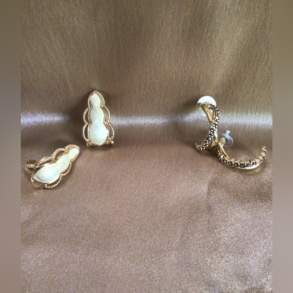 2 Pair of Gold Tone Earrings, 1 has a Cream Colored stone added to it.